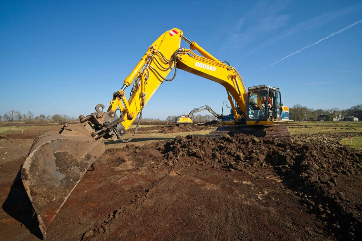 Concrete demolition and slab removal in progress